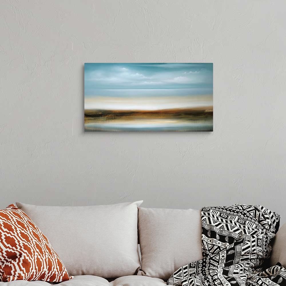 A bohemian room featuring A contemporary abstract painting of a smooth blue horizon.