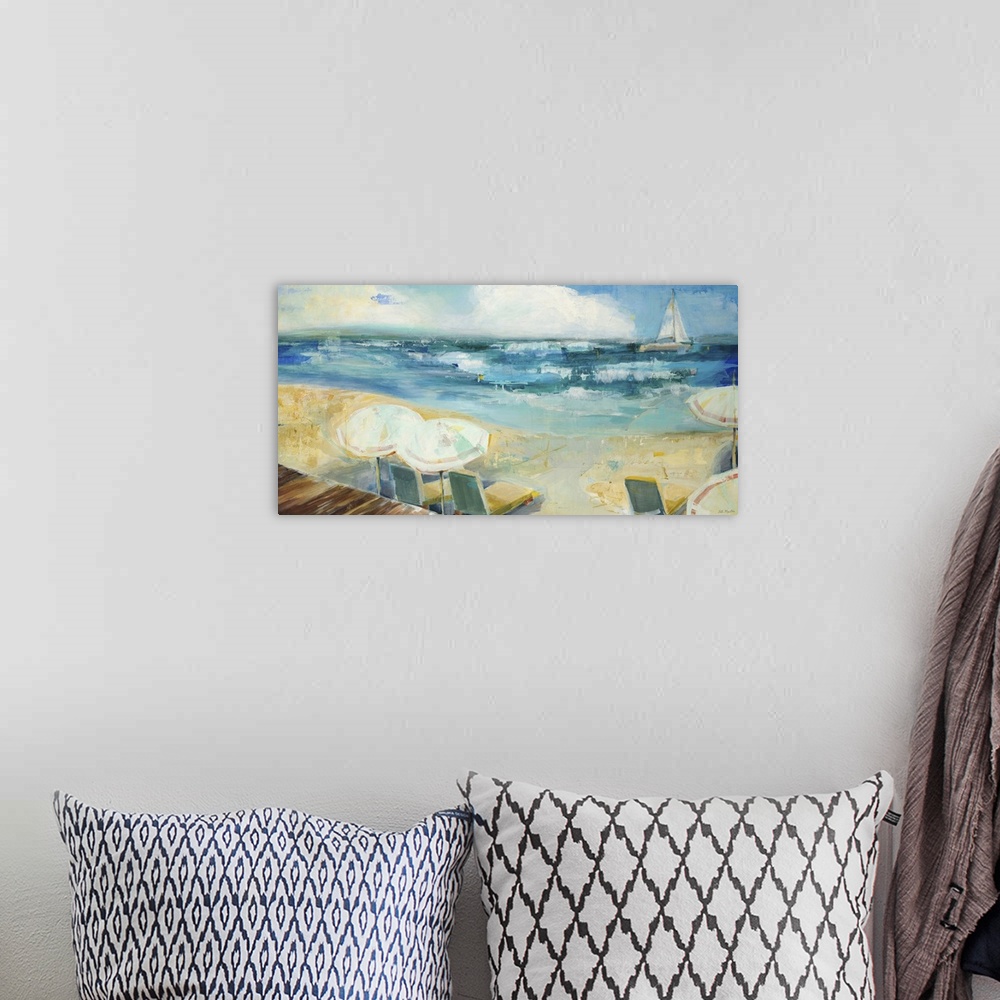 A bohemian room featuring Contemporary painting of a beach scene with a view of the sea.