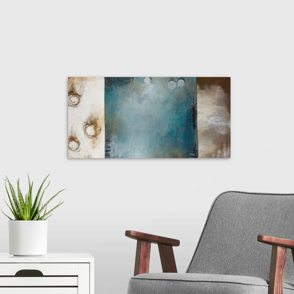 A modern room featuring Big abstract painting that includes a number of circles and squares that have mellow tones.