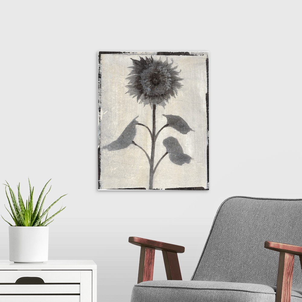 A modern room featuring Vertical contemporary painting of flowers in faded shades of grey with a rough, simple black border.