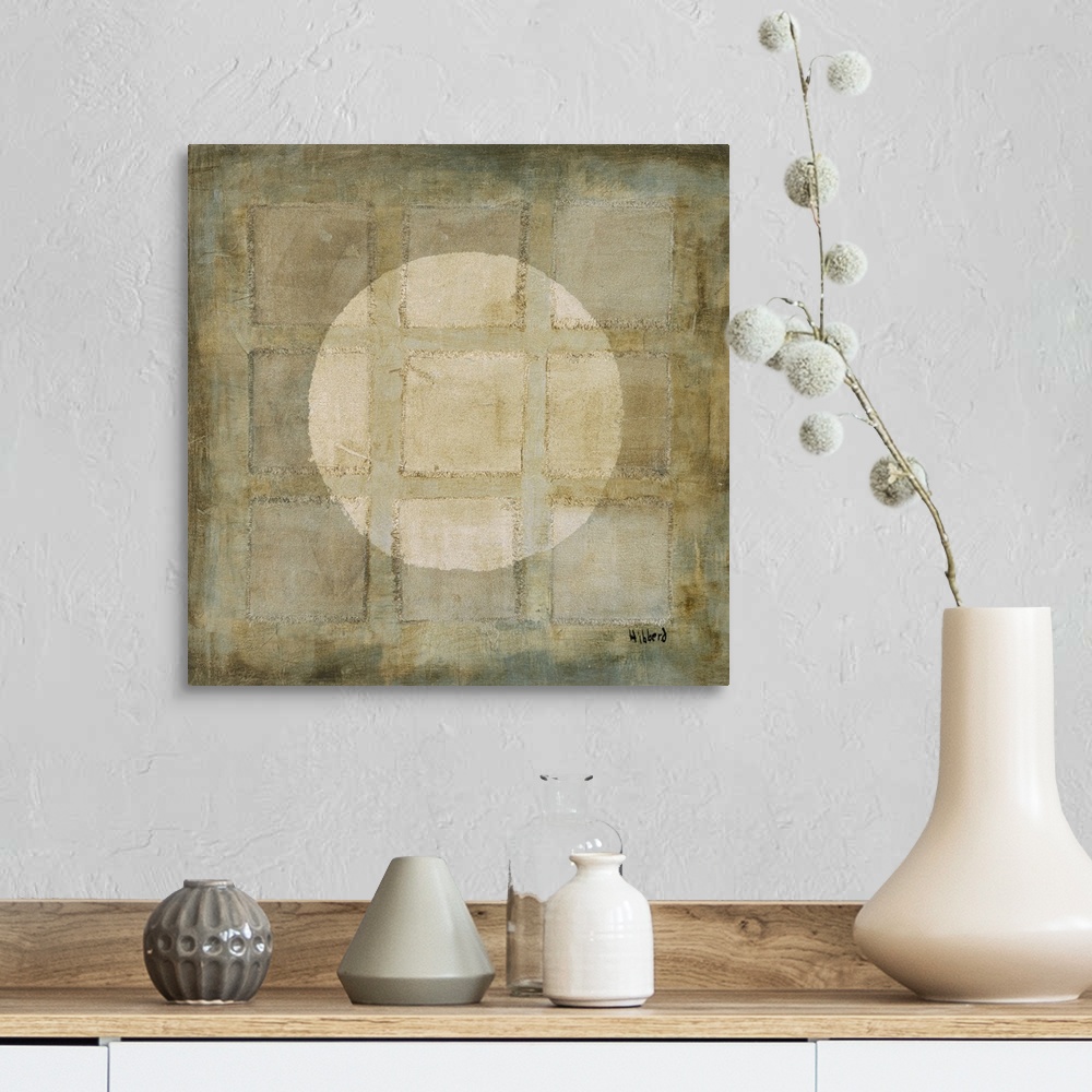 A farmhouse room featuring A modern painting of nine squares with a light colored circle overlapping, all in varies shades o...
