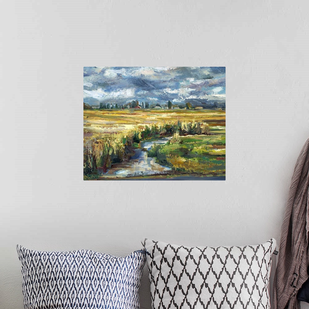 A bohemian room featuring Contemporary landscape painting of a plains with a creek running through it.