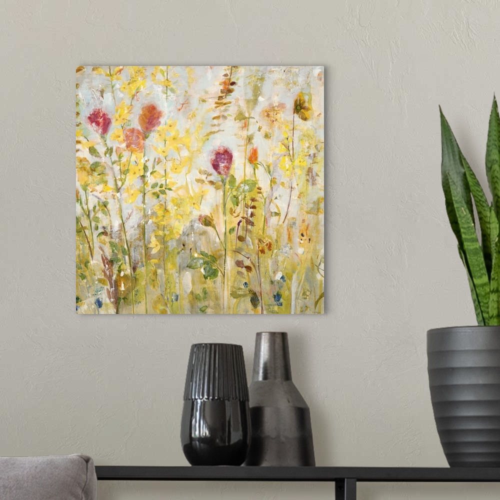 A modern room featuring A contemporary painting of a garden of pale red and yellow flowers.