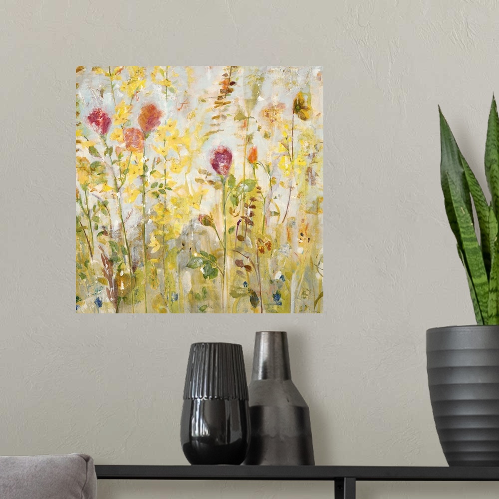 A modern room featuring A contemporary painting of a garden of pale red and yellow flowers.