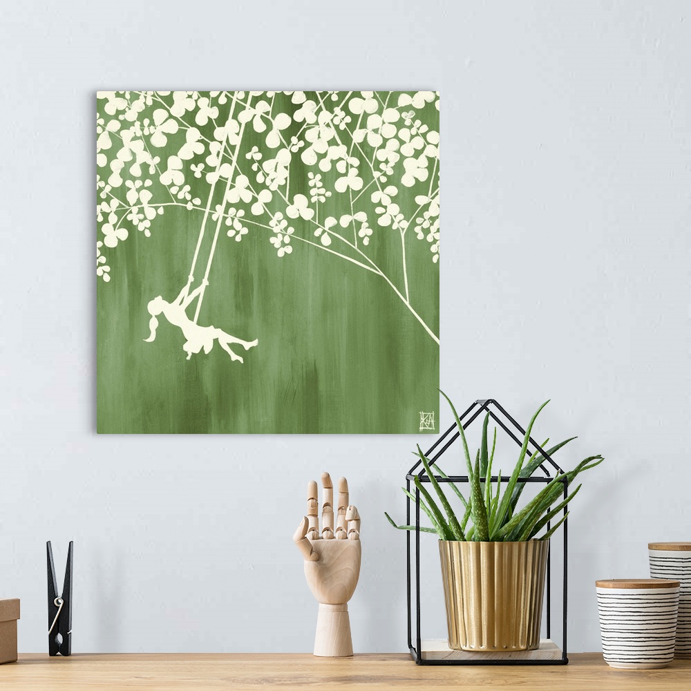 A bohemian room featuring This square decorative accent is an illustration of a silhouetted girl on a swing suspended from ...