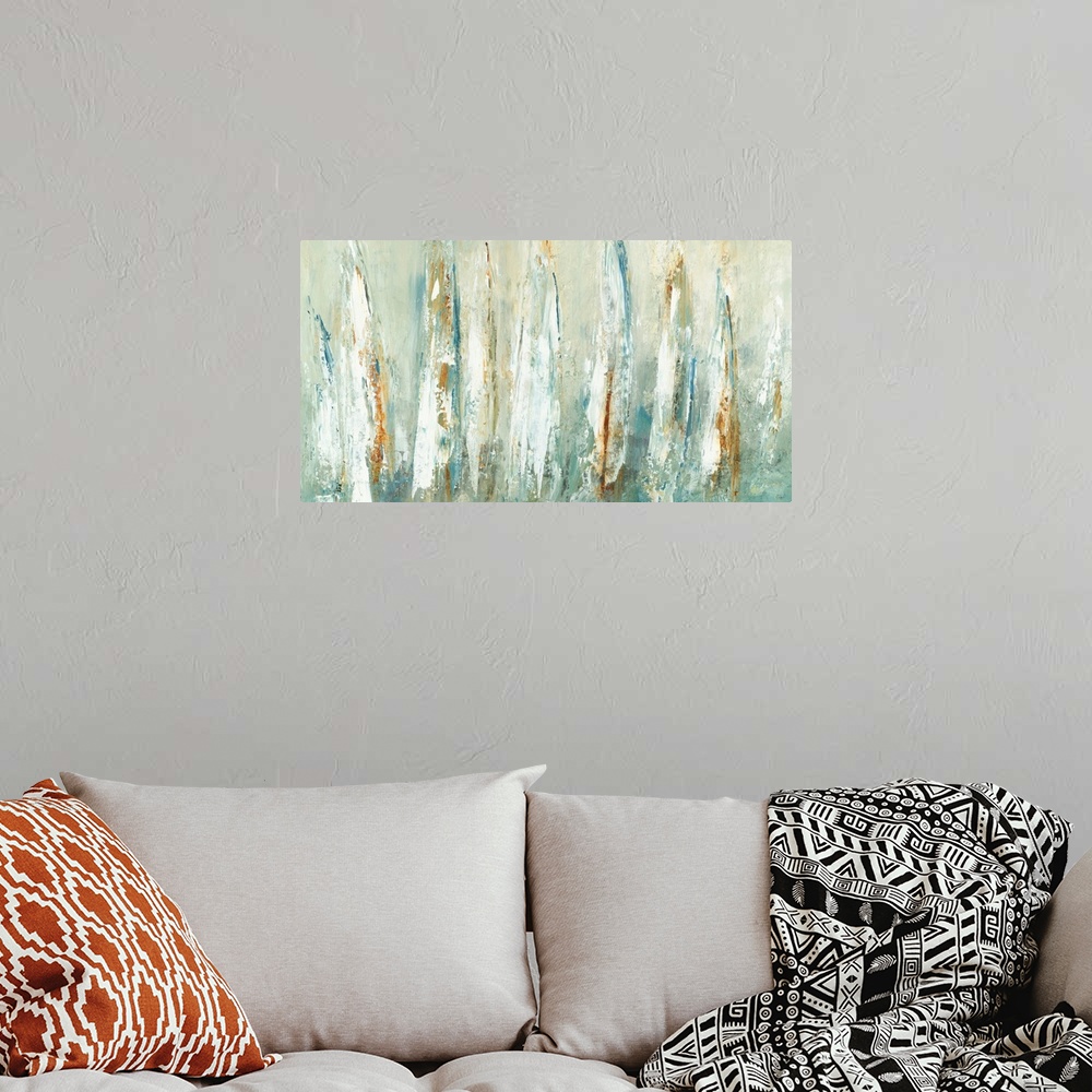 A bohemian room featuring Contemporary painting of abstract sailboat sails in shades of blue, brown, green, white, and yellow.