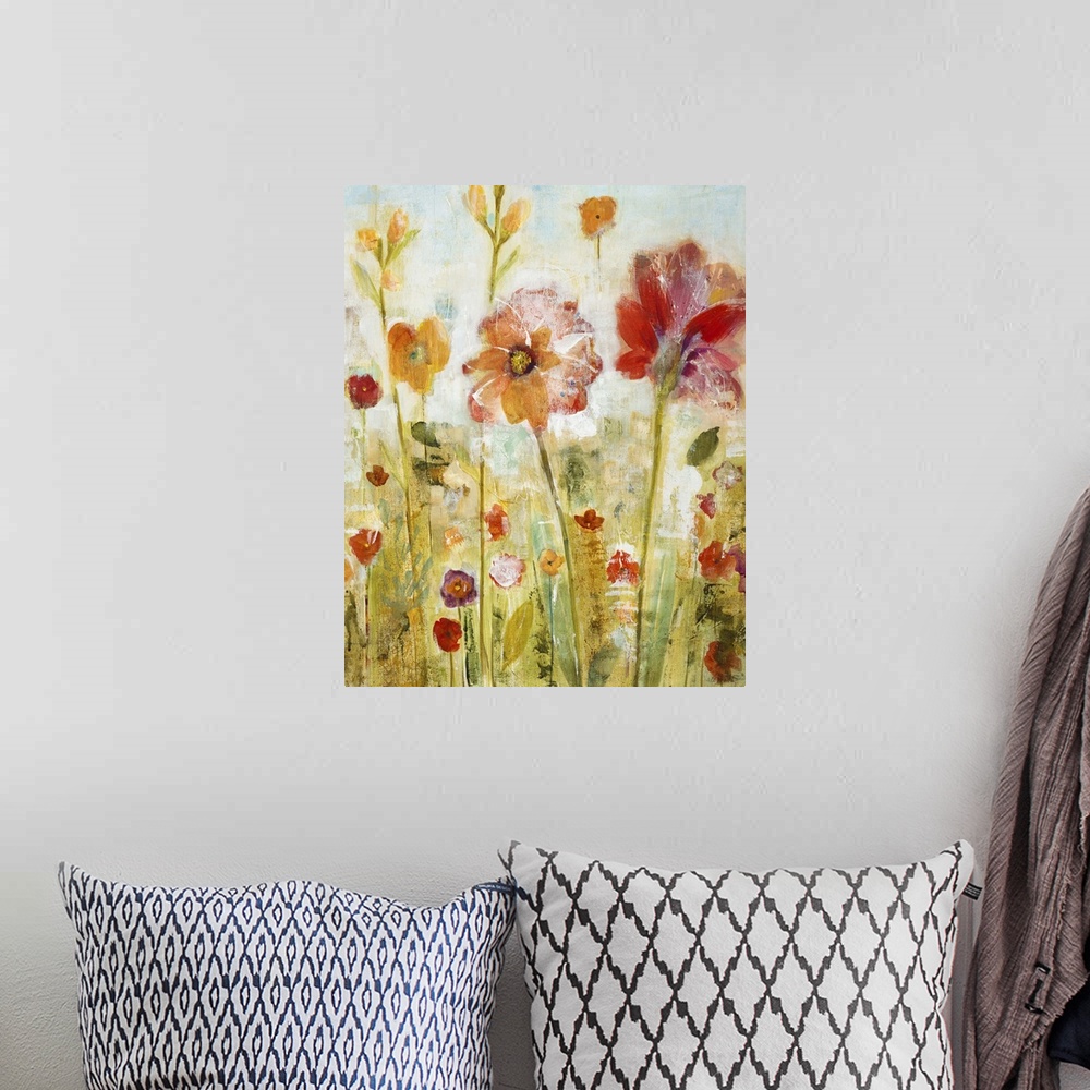 A bohemian room featuring Contemporary painting of pale red and orange wildflowers.