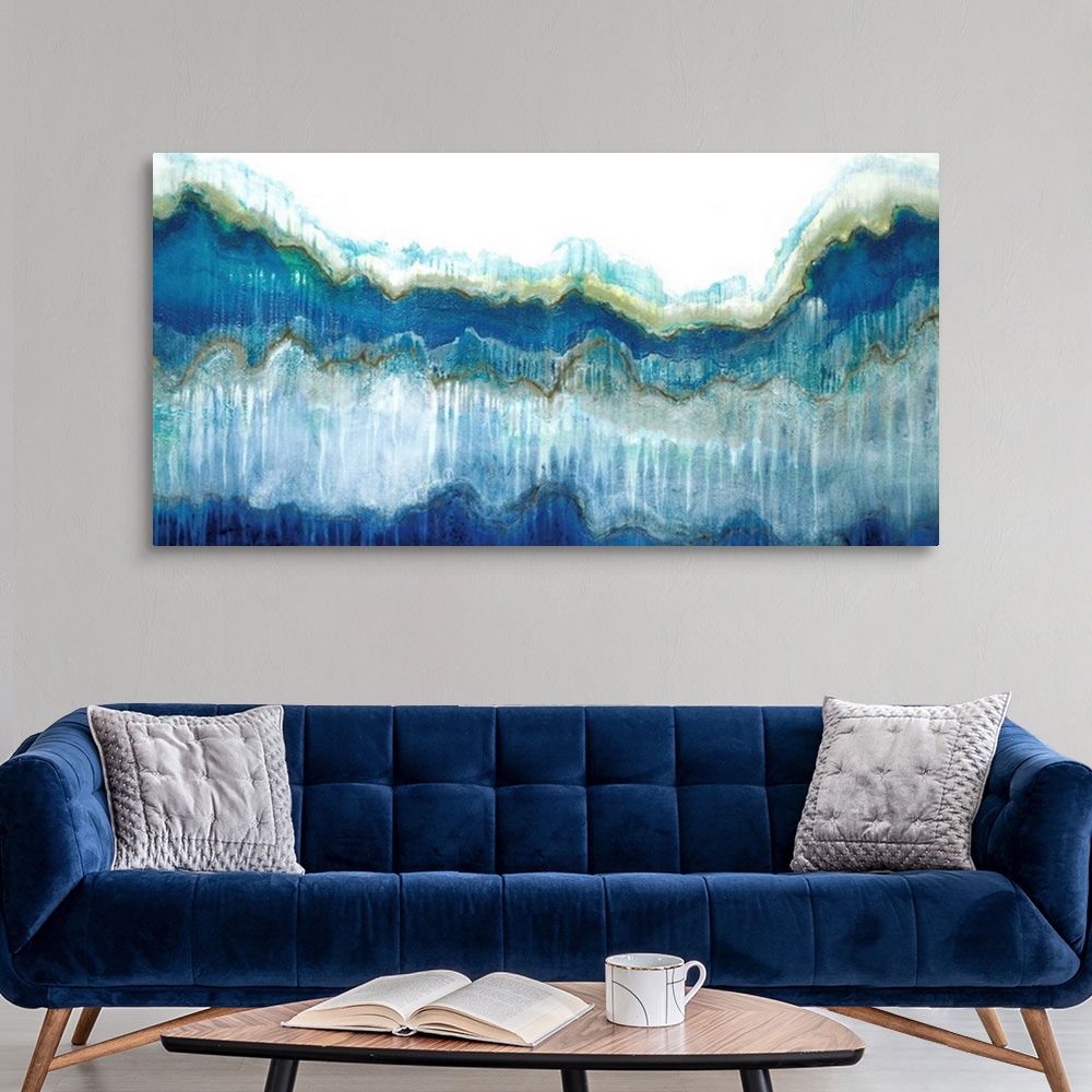 A modern room featuring Large abstract painting in shades of blue, green, brown, and gray representing a large wave.