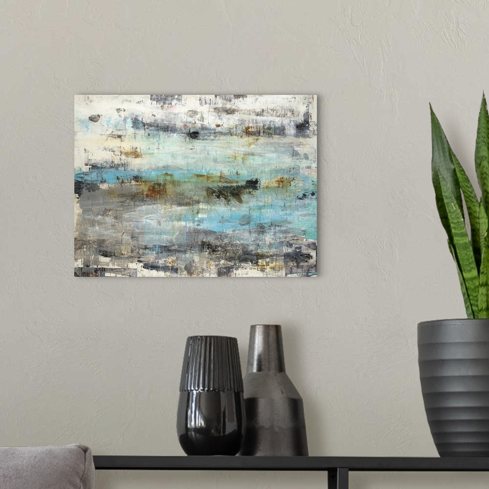 A modern room featuring Abstract painting with textured hues in shades of blue, gray, orange, and cream.