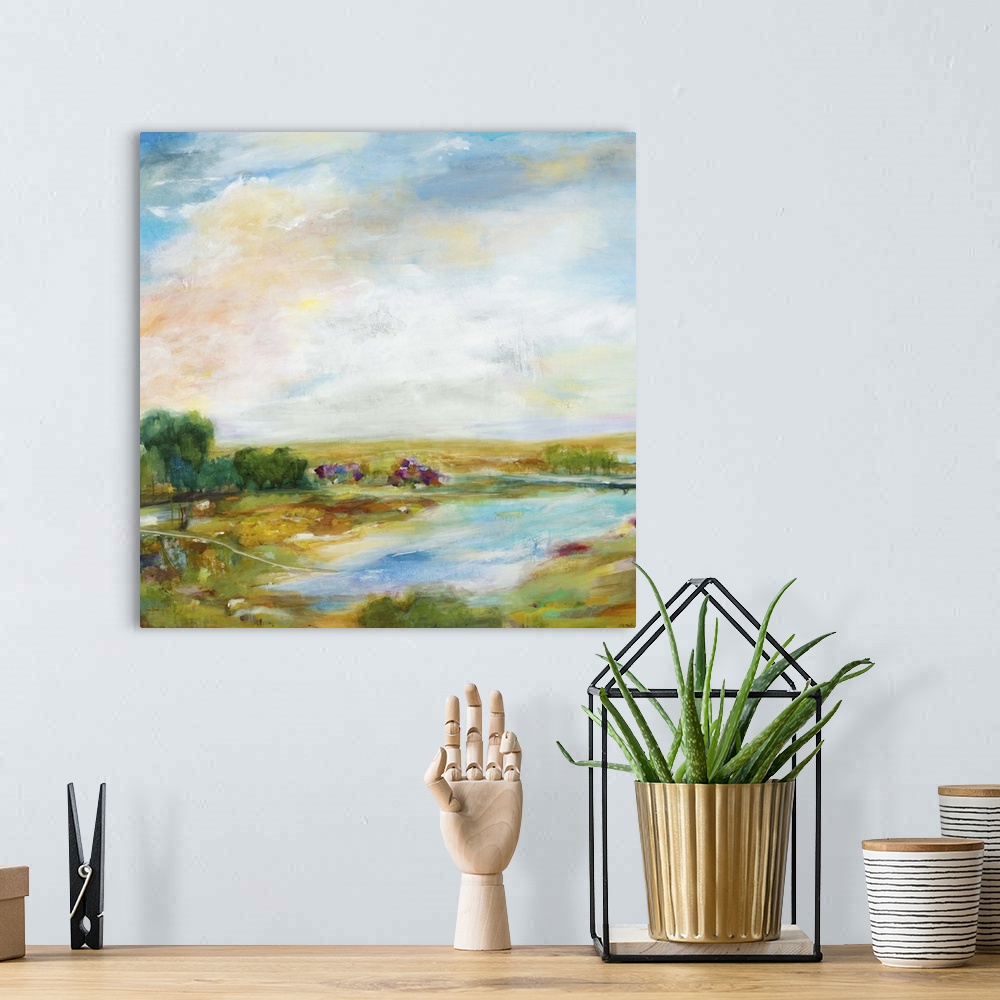 A bohemian room featuring Contemporary landscape painting looking out over a countryside pond.