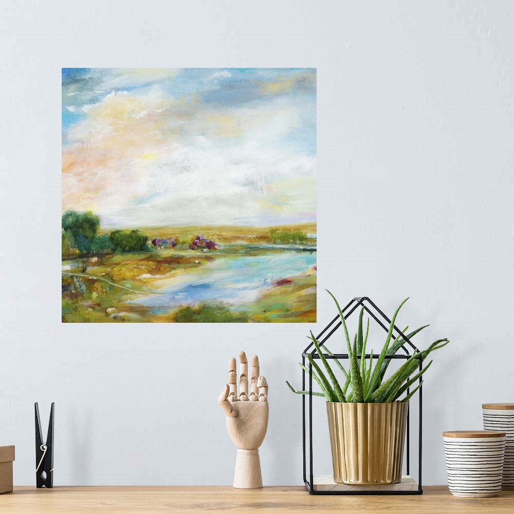 A bohemian room featuring Contemporary landscape painting looking out over a countryside pond.