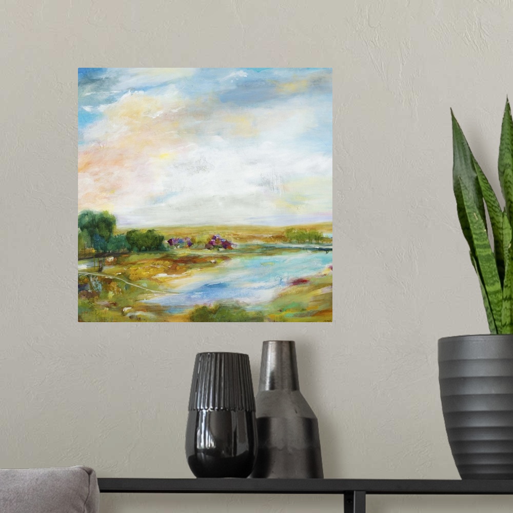 A modern room featuring Contemporary landscape painting looking out over a countryside pond.