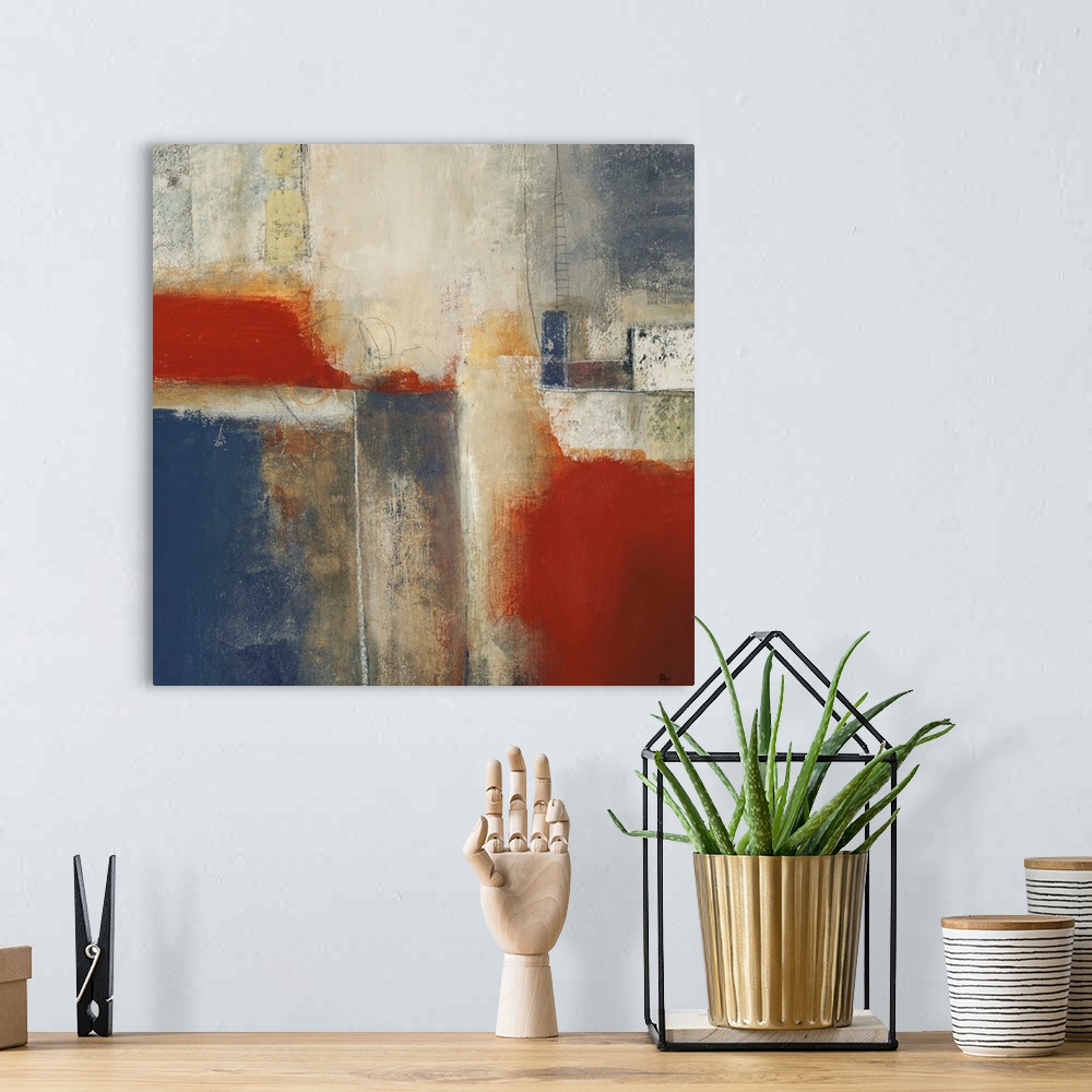 A bohemian room featuring This is a square abstract painting with area areas of layered color and sanded paint textures.