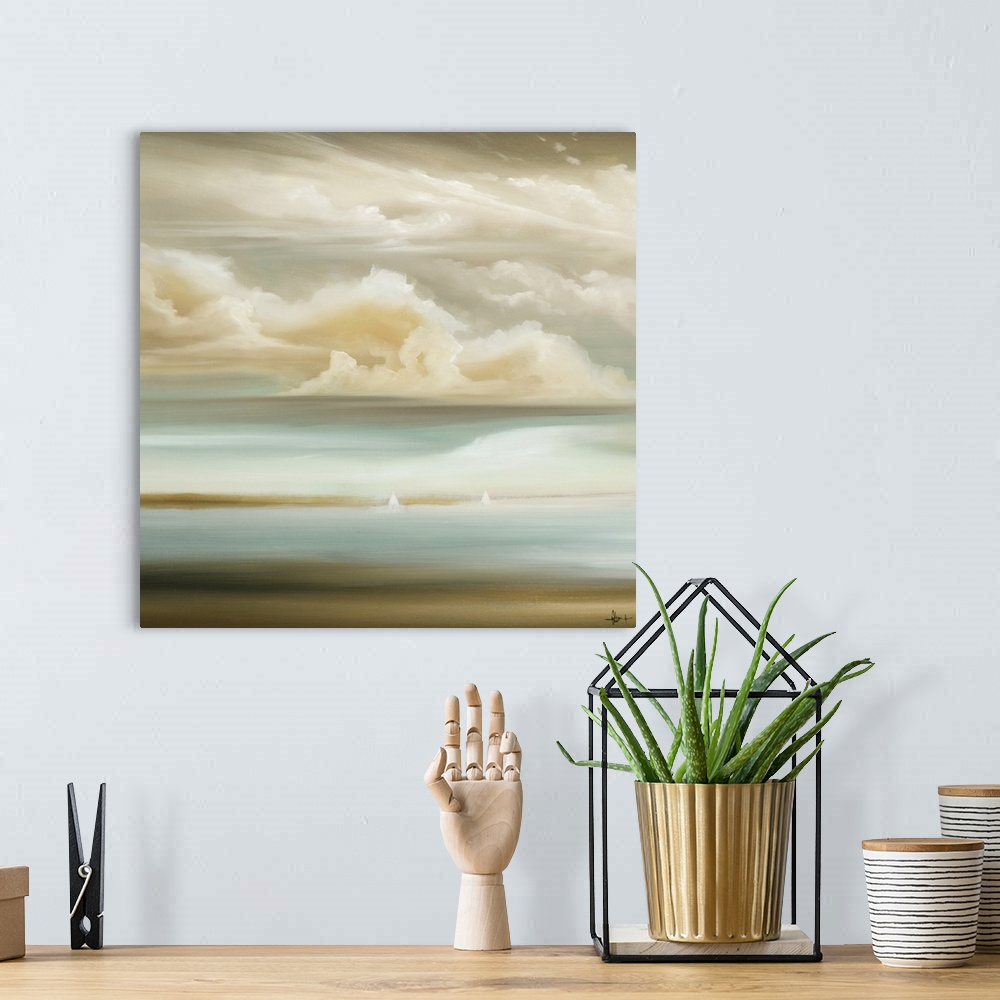 A bohemian room featuring A square painting of a seascape with a cloud filled sky and small white sailboats in the distance...