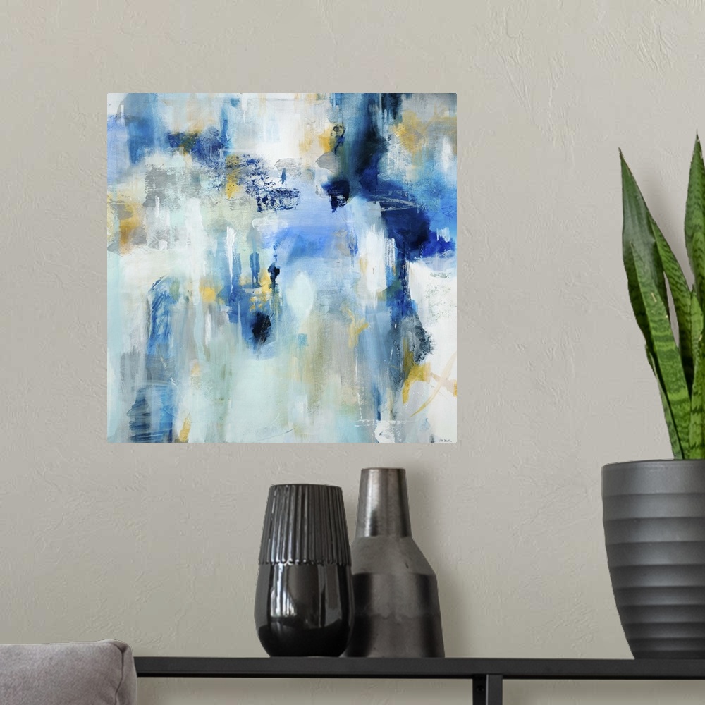 A modern room featuring Contemporary abstract painting using dark and light blue tones.