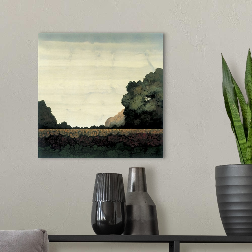 A modern room featuring Contemporary painting of a flat landscape with trees in the distance.