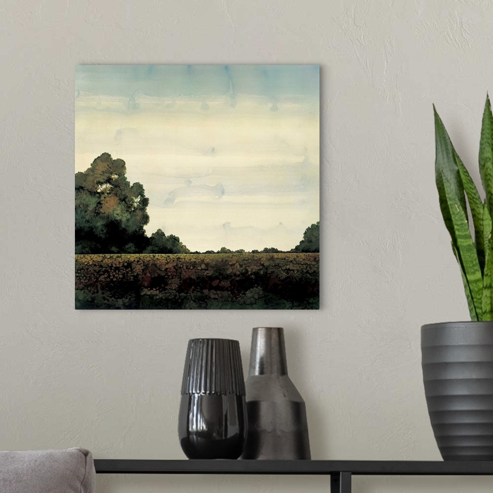 A modern room featuring Contemporary painting of a flat landscape with trees in the distance.