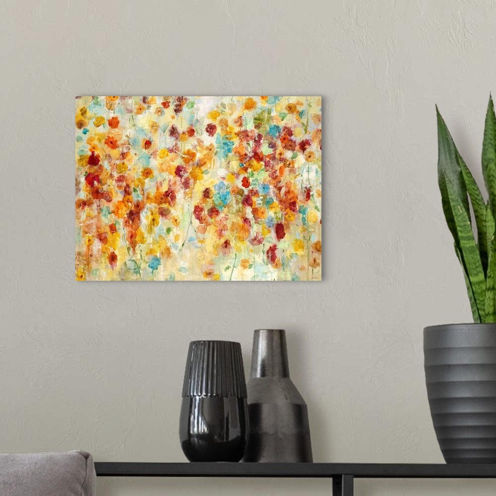 A modern room featuring A contemporary abstract flower painting using warm red orange and red tones.