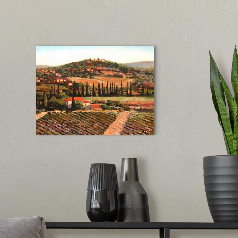 A modern room featuring Contemporary painting of a Tuscan landscape at sunset with vineyards and a village made with warm...