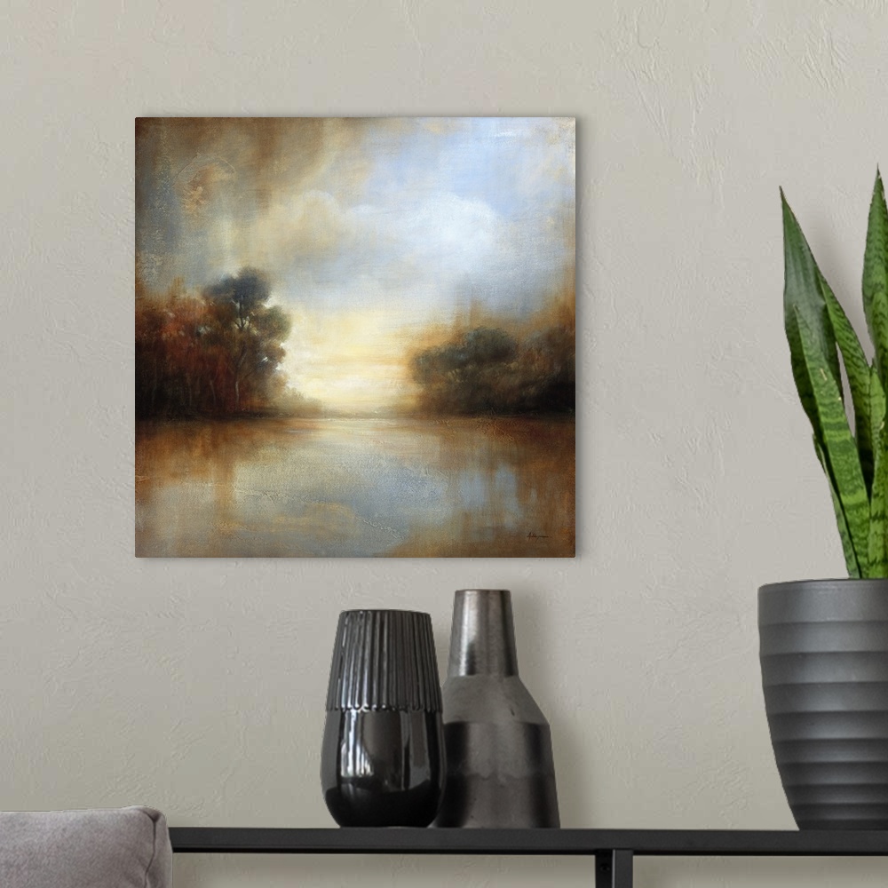 A modern room featuring Contemporary painting of a scenic landscape in warm earth tones.