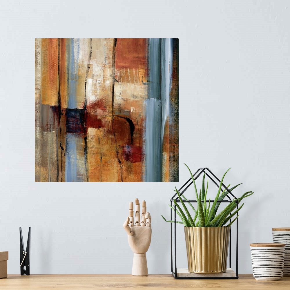 A bohemian room featuring This wall art is an abstract square painting of slates of brush strokes and paint textures.
