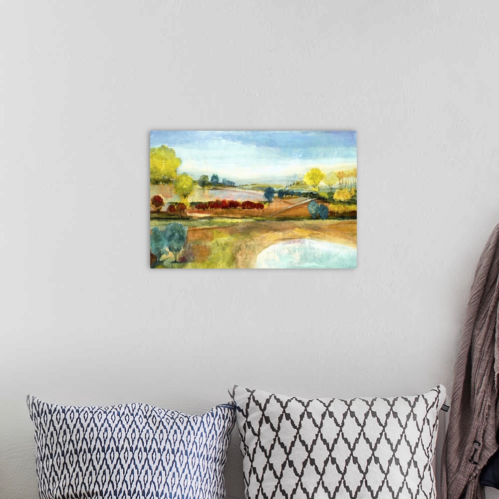 A bohemian room featuring Contemporary landscape painting looking out rolling countryside.