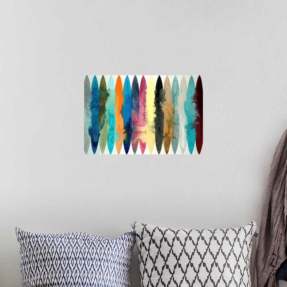 A bohemian room featuring Large abstract painting with different colored oblong shapes lined up together going across the c...