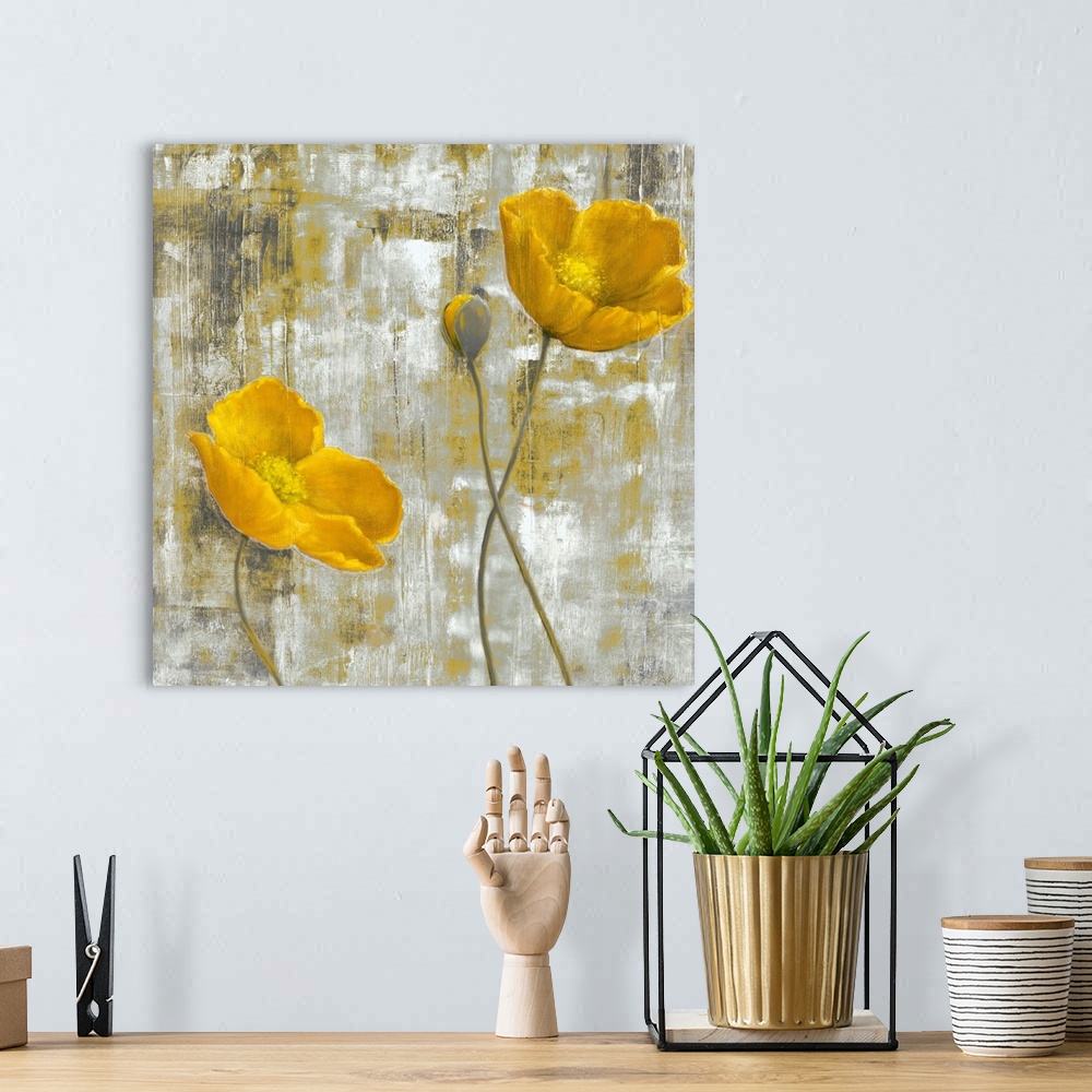 A bohemian room featuring Contemporary artwork of two yellow flowers and a third budding flower. The background is abstract...