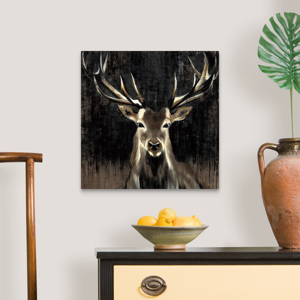 A traditional room featuring Contemporary painting of a stag against a dark background.