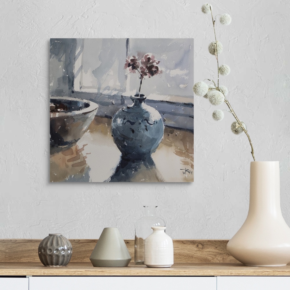 A farmhouse room featuring A soft blue decorative vase sits restfully on a table in this contemporary artwork.