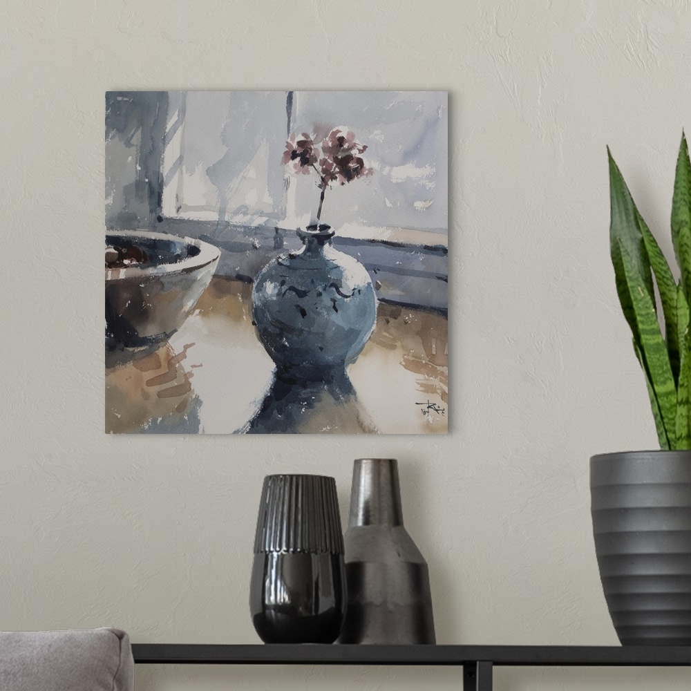 A modern room featuring A soft blue decorative vase sits restfully on a table in this contemporary artwork.