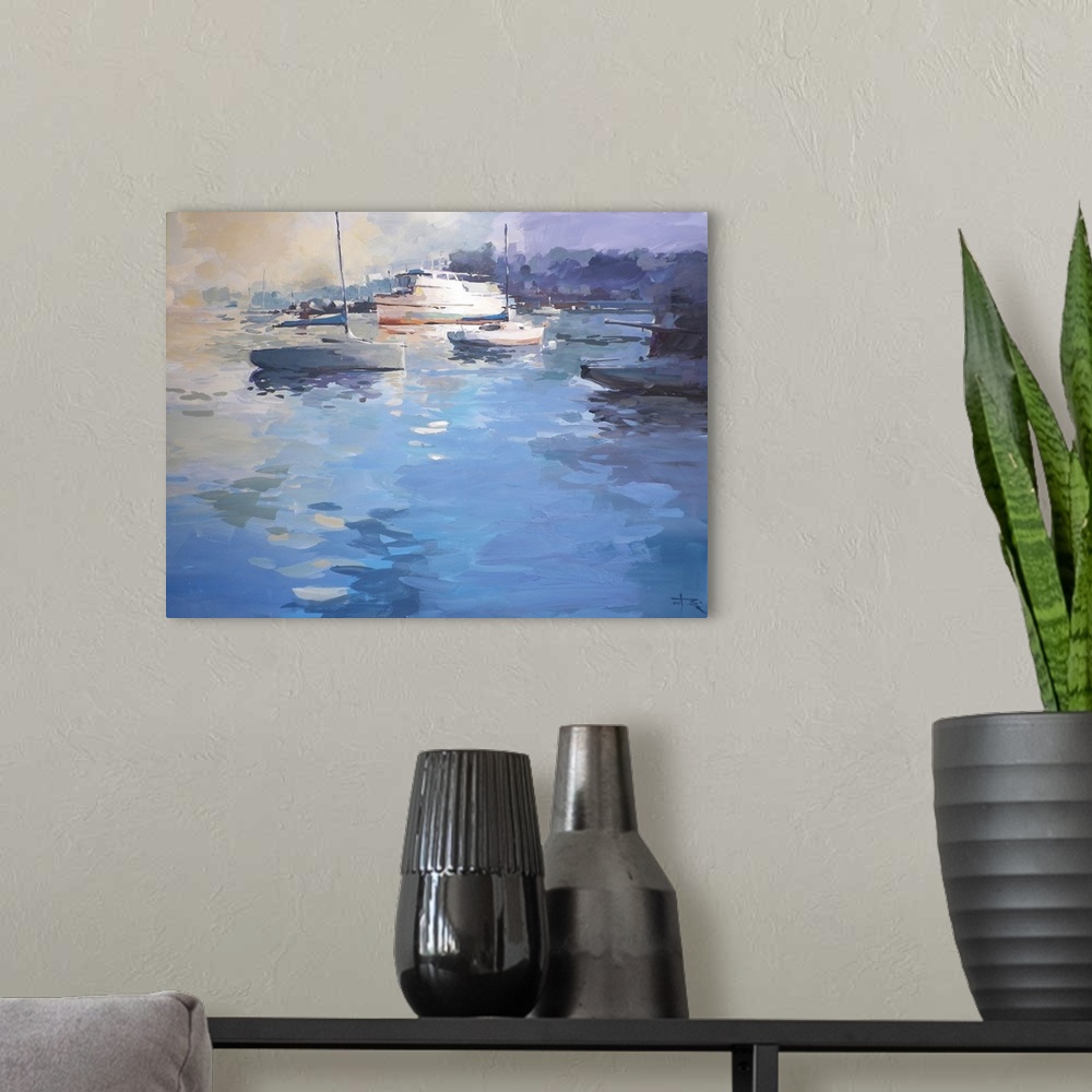 A modern room featuring This contemporary artwork uses stylized shapes to depict a large body of water in the foreground ...