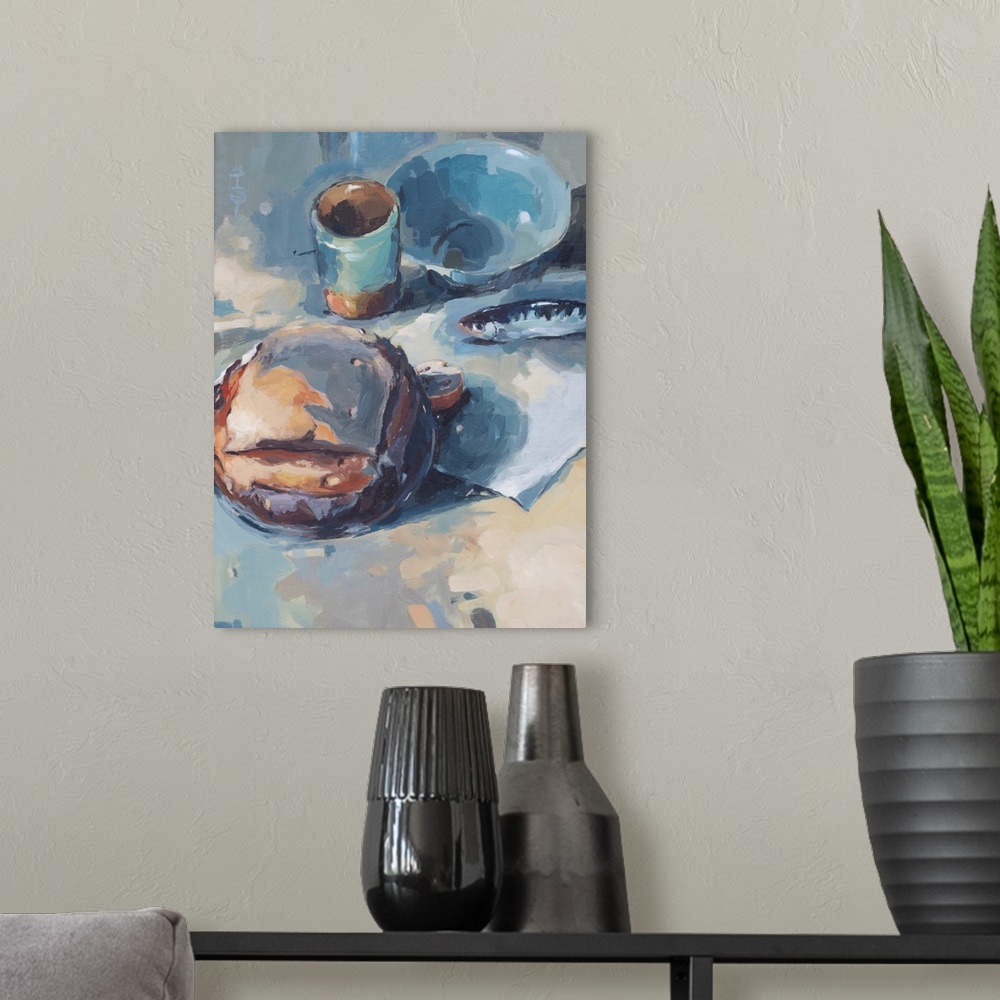 A modern room featuring Contemporary watercolor painting of a loaf of bread and a small fish - reminiscent of a simple me...
