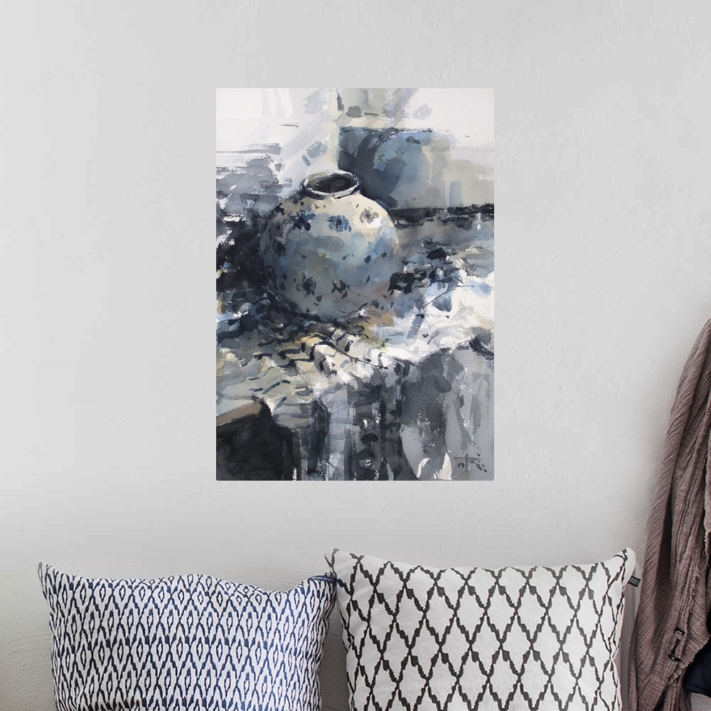 A bohemian room featuring A monochromatic blue vase sits restfully on a table in this contemporary artwork.