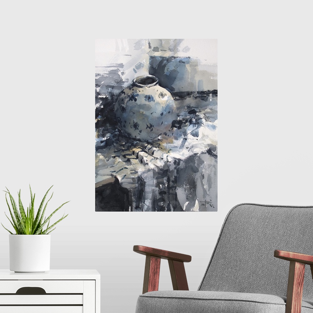A modern room featuring A monochromatic blue vase sits restfully on a table in this contemporary artwork.