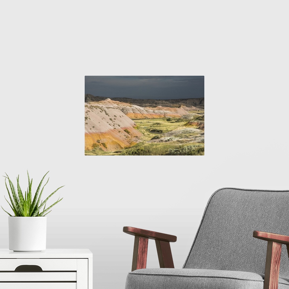 A modern room featuring Dark skies over the striated rock formations in Badlands National Park, South Dakota.
