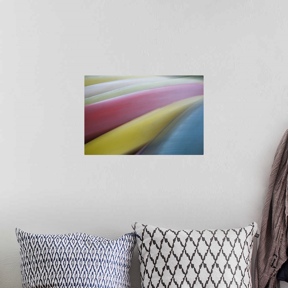 A bohemian room featuring Abstract image of pastel colored canoes on Madeline Island, Wisconsin.