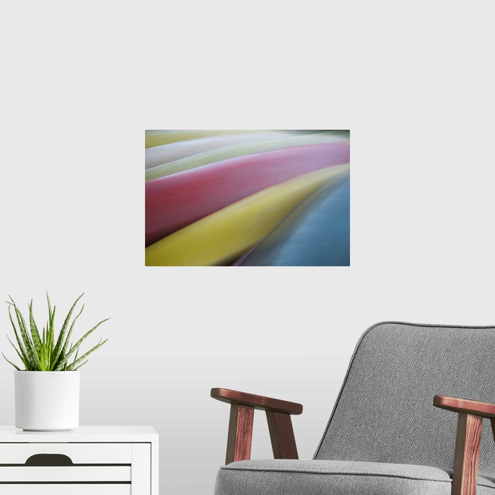 A modern room featuring Abstract image of pastel colored canoes on Madeline Island, Wisconsin.