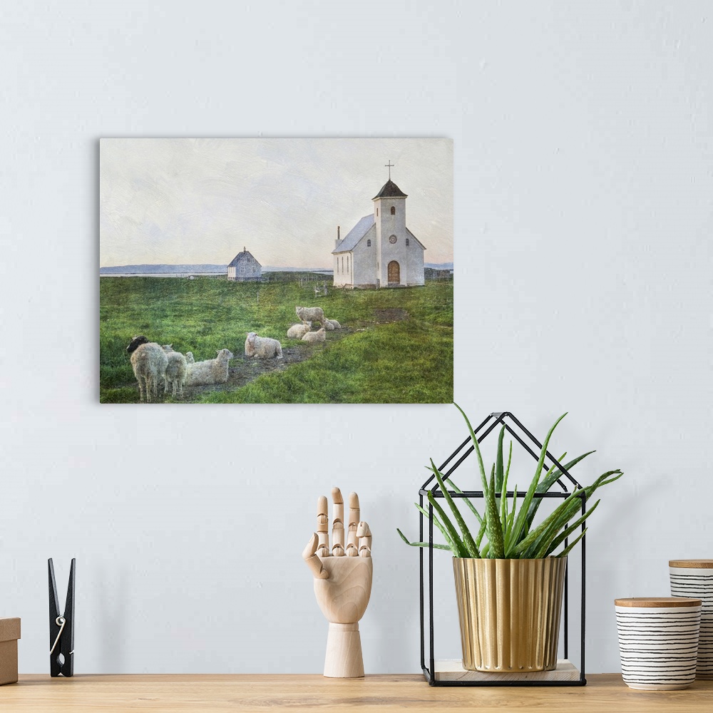 A bohemian room featuring A small flock of sheep in the field near a white church in Iceland.