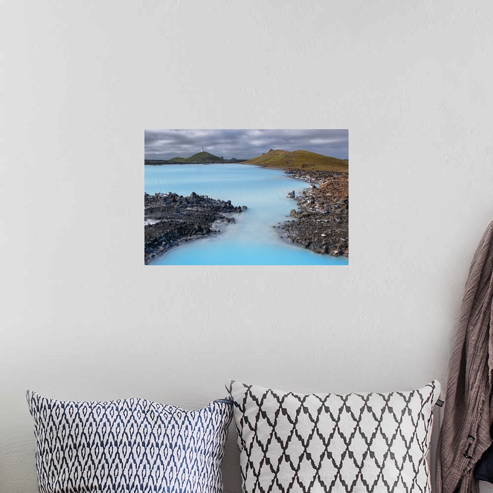 A bohemian room featuring Vivid blue waters of a lake in the wilderness of Kevlivik, Iceland.