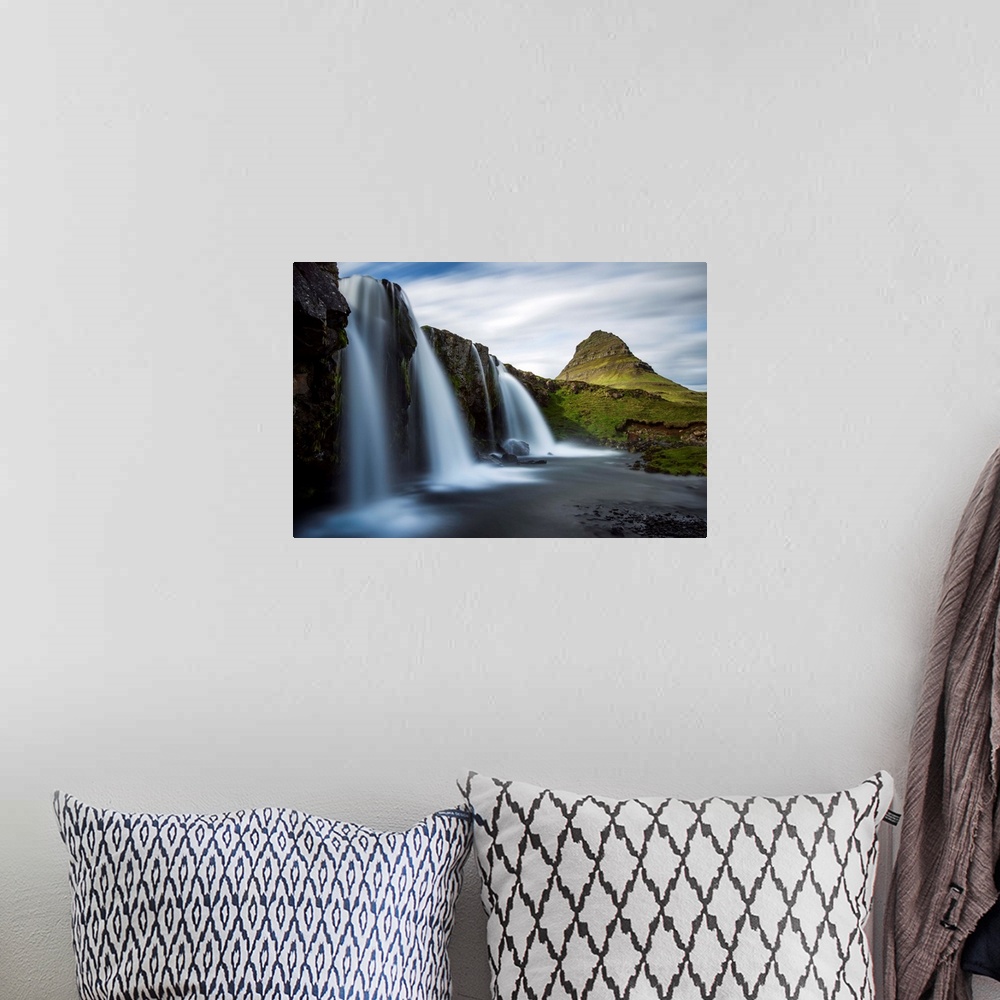 A bohemian room featuring Waterfalls in Iceland with verdant Mount Kirkjufell in the distance.