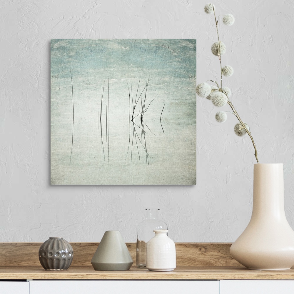A farmhouse room featuring Abstract photo of thin reeds in the water with mirror images reflected.