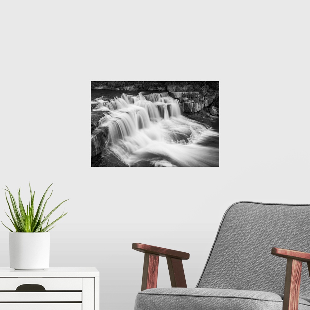 A modern room featuring Long exposure photo of rushing waterfalls in Taughannock Falls State Park, New York.