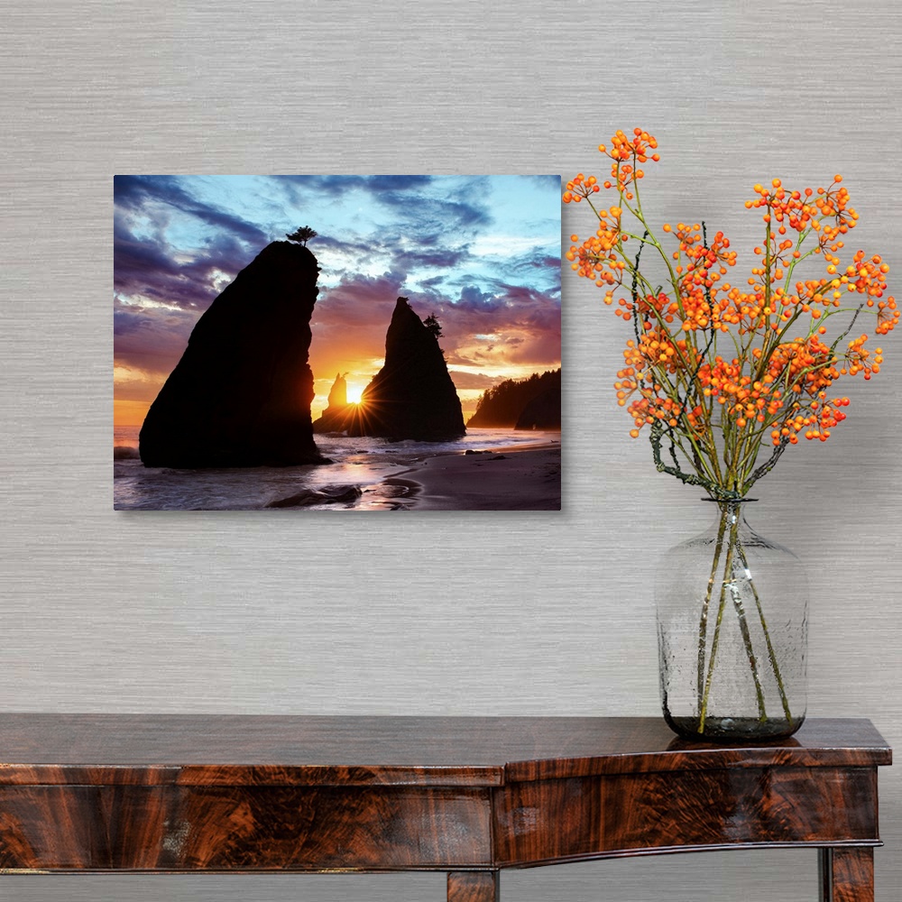 A traditional room featuring Sea stacks silhouetted by the sunset light on the Washington coast.