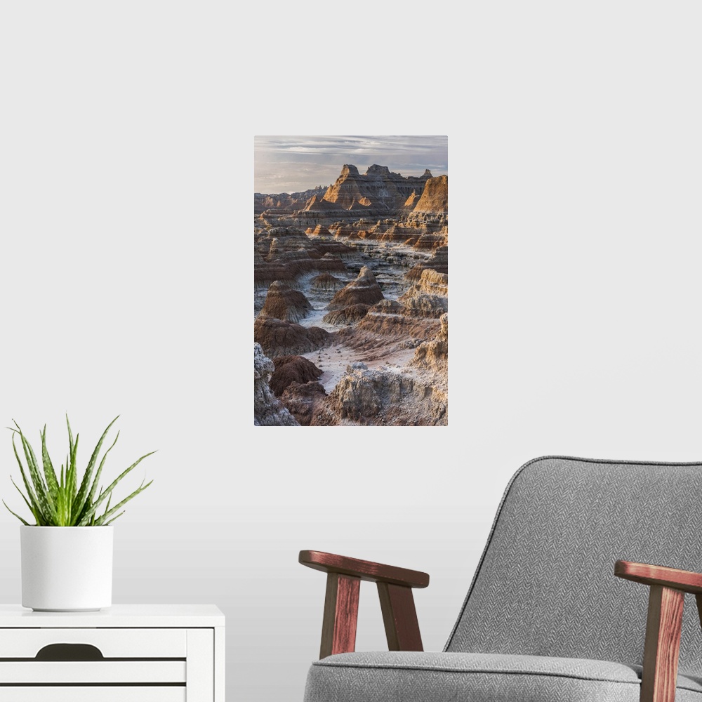 A modern room featuring Rocky eroded landscape with pointed rock formations in the Badlands, South Dakota.