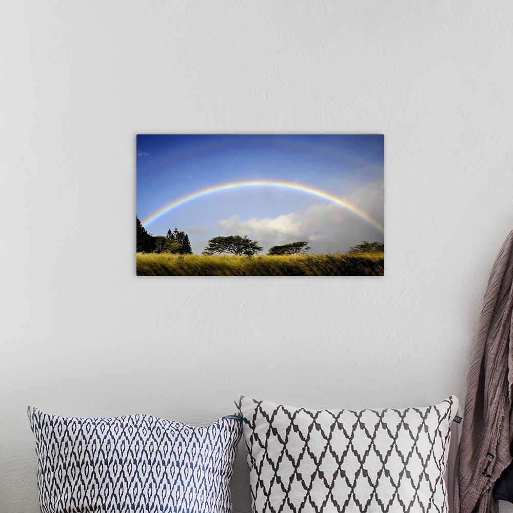 A bohemian room featuring A double rainbow above countryside