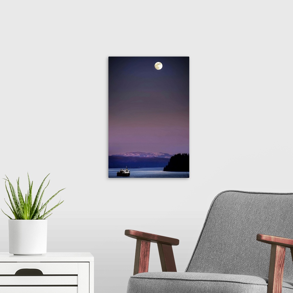A modern room featuring A full moon at night above snow capped mountains and a ship