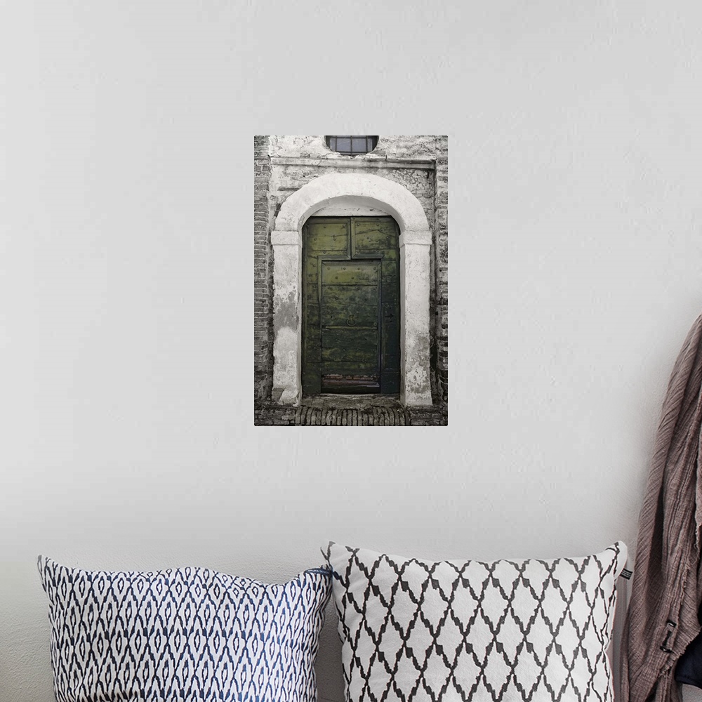A bohemian room featuring A green door Penne, a comune in the province of Pescara, in the Abruzzo Region of central Italy. ...