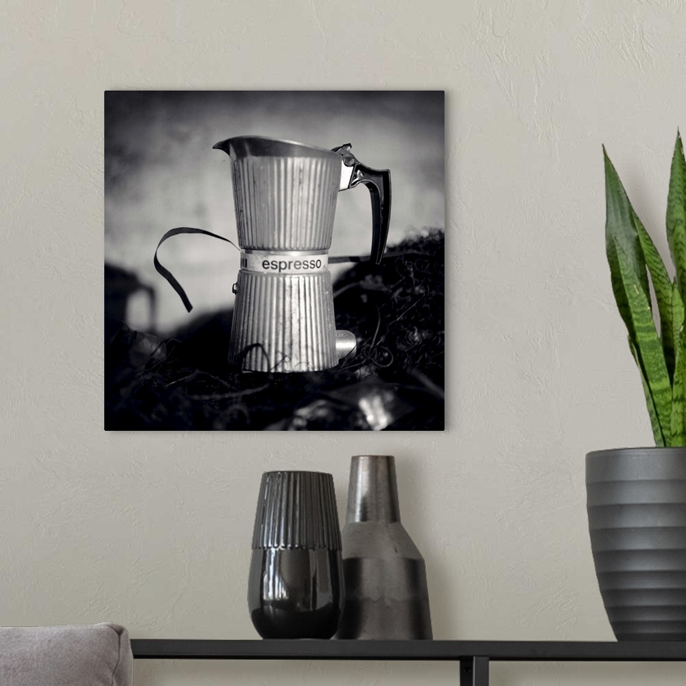 A modern room featuring An espresso coffee maker