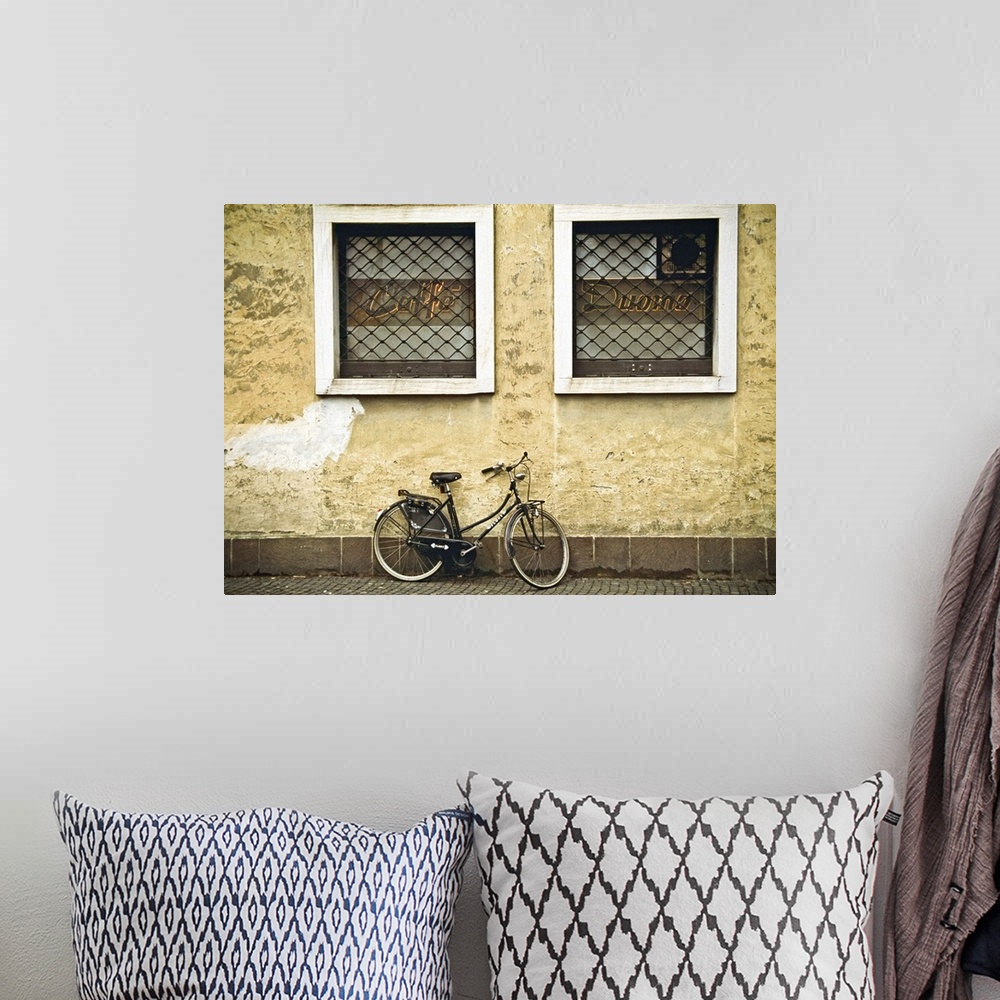A bohemian room featuring A bicycle on a street no.2